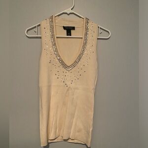 White House Black Market cream color tank. No tags but never worn.